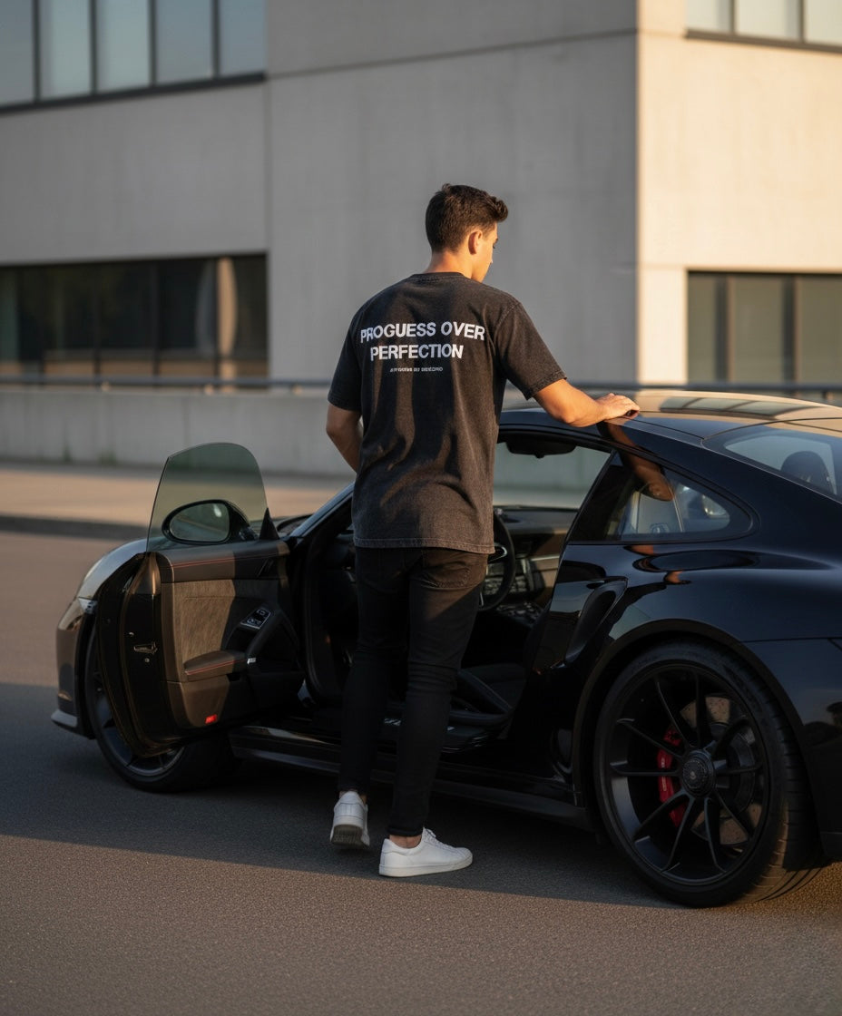 Camiseta Oversize Negra "Progress Over Perfection" | Suicono