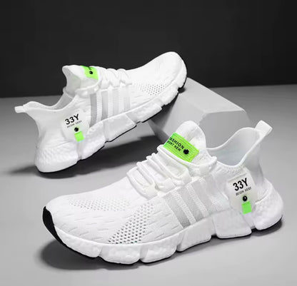 Zapatillas de hombre con malla transpirable de color neutro, diseño ligero y ideal para caminar o correr.